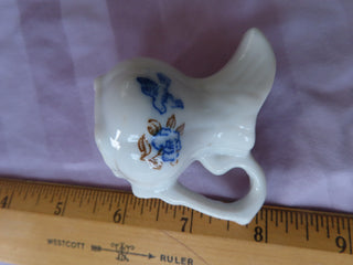 small porcelain flower pitcher