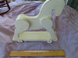 White pull horse toy