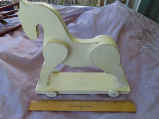 White pull horse toy