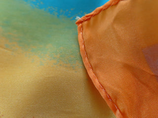 Large scarf in oranges