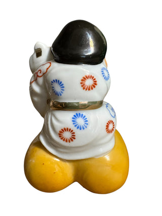 Japanese Porcelain Figurine Man Carrying Sack