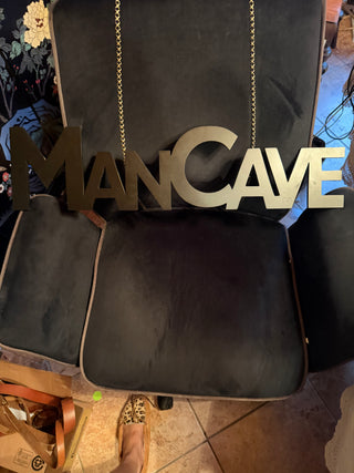 Mancave black sign VV