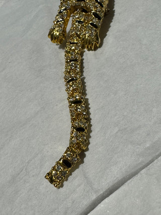 Articulate rhinestone tiger pin