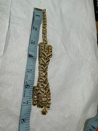 Articulate rhinestone tiger pin