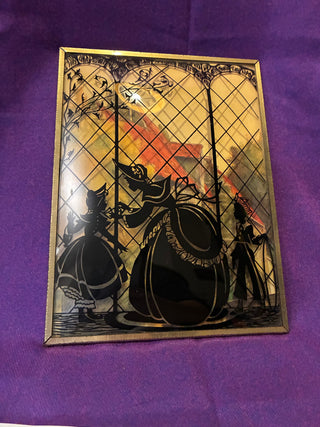 Antique silhouette painted in convex glass. Art. Picture.