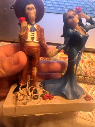Day of the Dead Holding Hand Skulls