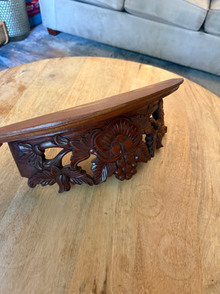 Vintage hand-carved wood demilune wall shelf
