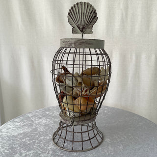 wire cage w/ seashells