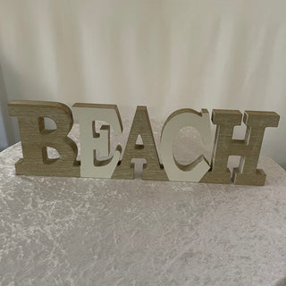 wood beach sign