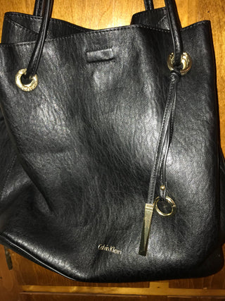 Calvin Klein black leather purse w/gold accents
