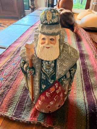Hand crafted Santa multicolored with green coat signed