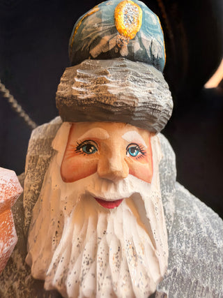 Hand crafted Santa multicolored with green coat signed