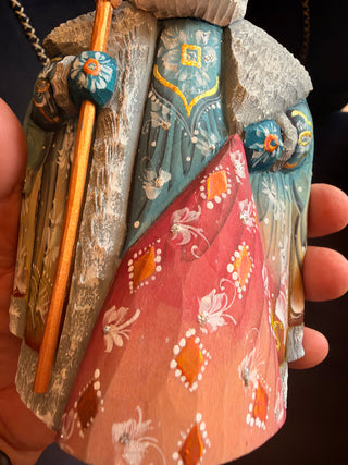 Hand crafted Santa multicolored with green coat signed