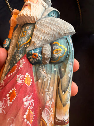 Hand crafted Santa multicolored with green coat signed