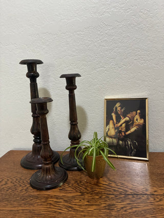 Set of 3 metal ornate candlesticks