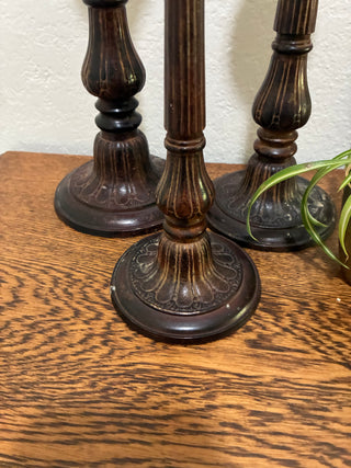 Set of 3 metal ornate candlesticks