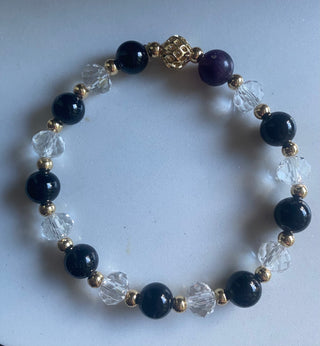 Black/gold/clear bracelet