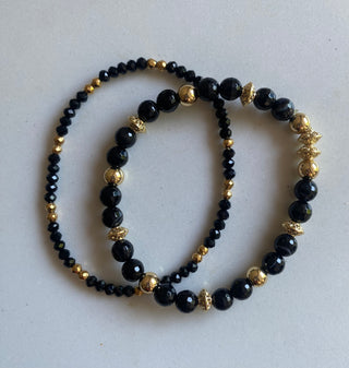Gold/black bracelets, set of 2