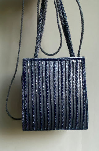 Small shiny gray/silver purse w/ beads