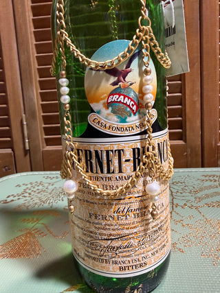 Pearl/gold wine bottle cover
