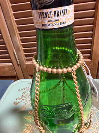 Pearl/gold wine bottle cover