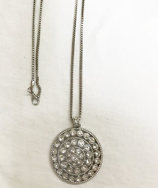 Silver necklace w/ faux diamond circle pendant