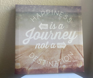 “Happiness is a journey, not a destination” sign