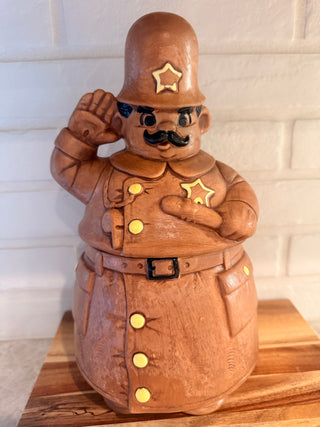 vintage mid-century ceramic cookie jar depicting a Keystone Cop or police officer Cook Jar