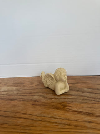 ceramic cherub figurine