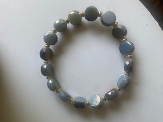 Grayish blue flat beaded bracelet/gold accents
