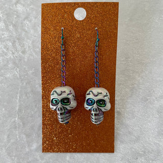 Halloween earrings, skulls on chains