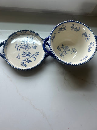 Temp-tations by Tara Floral Lace soup crock in Cobalt Blue, featuring a delicate white floral pattern and a bead-textured rim.Design: Cobalt blue ceramic with a white floral lace pattern and handle accents.Material: Constructed from durable ceramic design