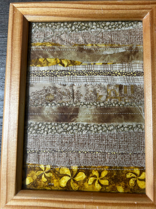 Framed fabric collage goldbrn