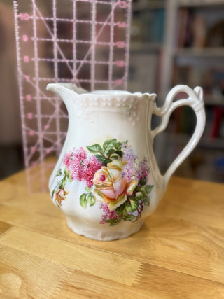Vintage Floral Porcelain Pitcher – Pink & Yellow Roses, Lilac Flowers & Elegant Scalloped Handle