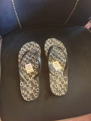 Michael Kors Jory Center black flip flops New