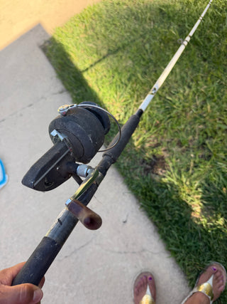 Vintage D.A.M quick spinning reel and a Tiger Combo fishing pole VV
