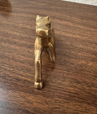 Vintage brass horse resting