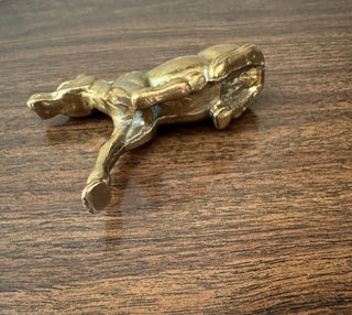 Vintage brass horse resting