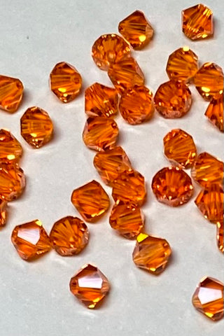 Swarovski Bicone 10 mm Topaz 8pk