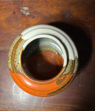 Signed handmade lava pottery vase o,w&brown