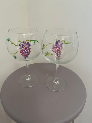 Wine glasses with grapes