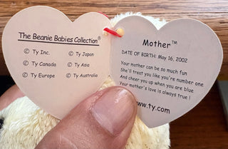 yellow Bliss Marketplace Beanie Baby - "Mother the Bear" 2002 yellow w/purple flowers