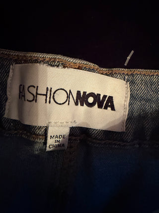 Fashion Nova distress denim shorts with fringe rhinestone tassels along the side  size 3