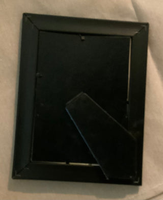 MG vintage print in black frame