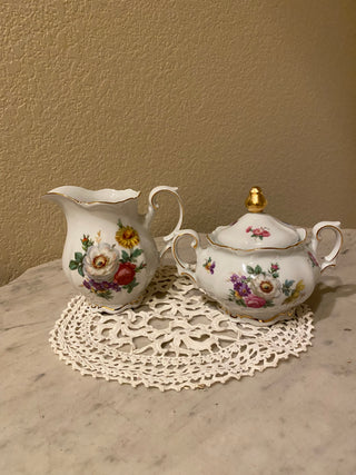 Rare porcelain floral sugar bowl and creamer RCD