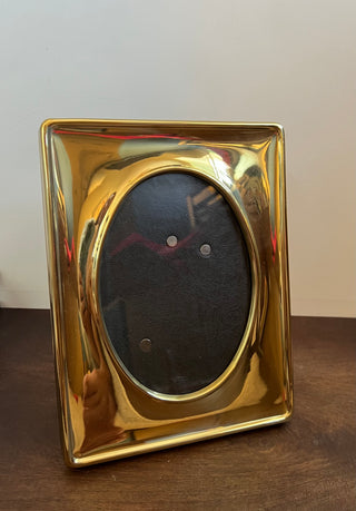 Vintage brass oval frame