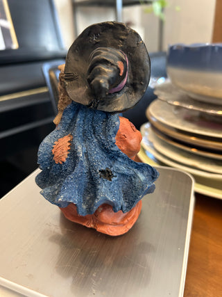 Witch In Brown Dress Holding Owl