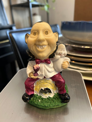 Smiling Resin Vampire Holding Ghost