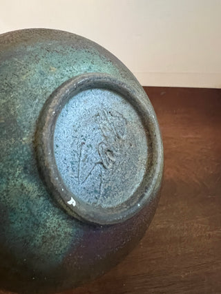 Mini black pottery vessel