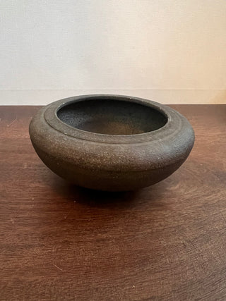 Mini black pottery vessel